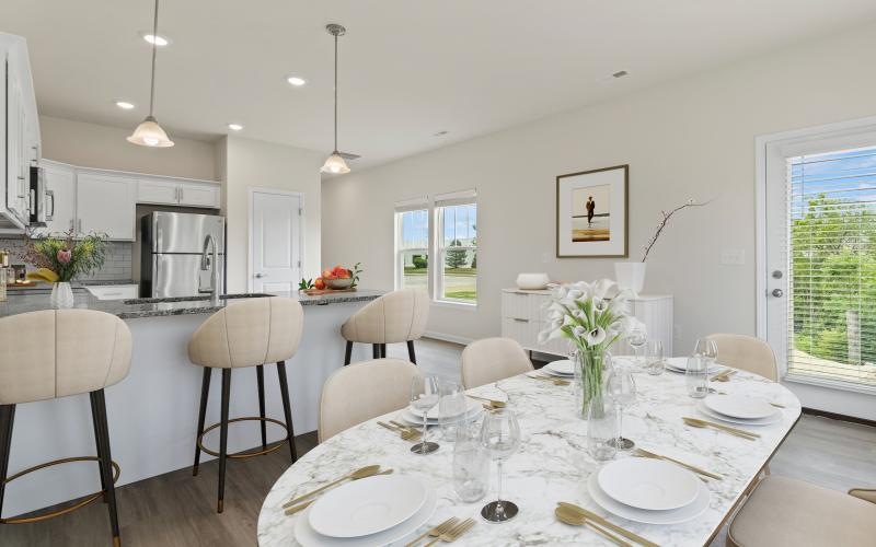 a dining room with a table set