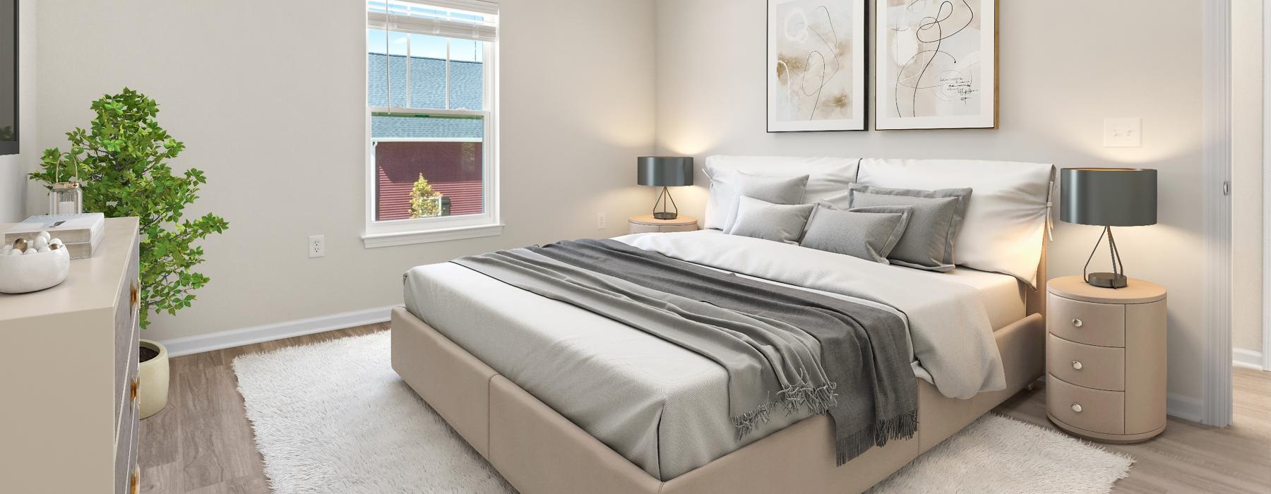 a bedroom with a bed and a fan