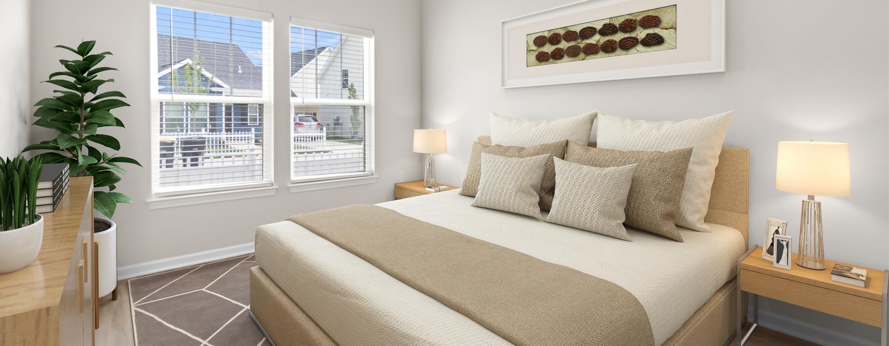 sun filled bedroom with large windows